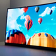 Image for article titled Samsung's Got a Giant OLED TV That Curves (Updated: Hands On)